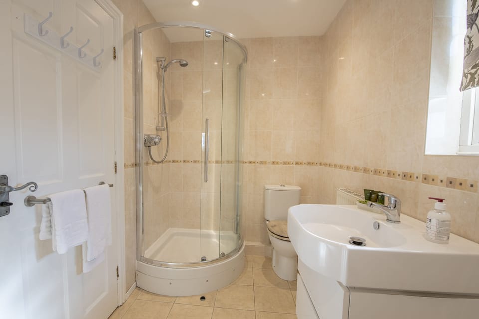 First floor: Family bathroom with walk in shower