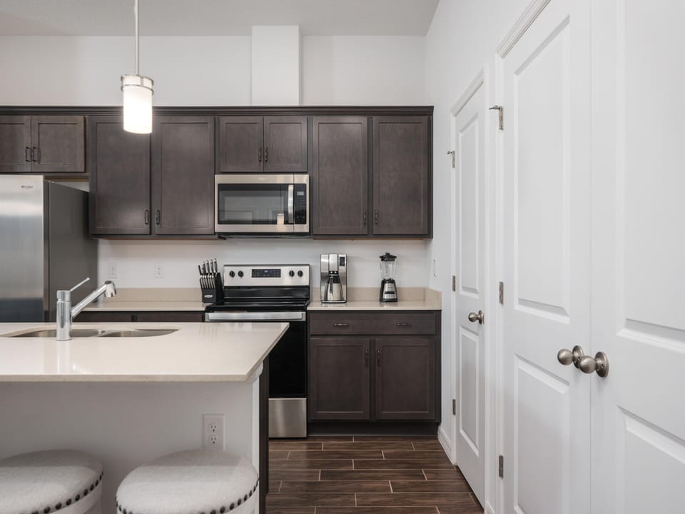 Fully Equipped Kitchen with Stainless Steel Appliances