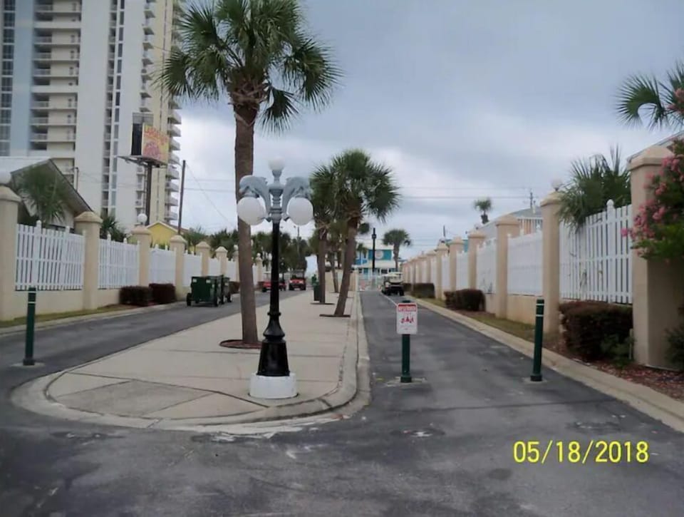 Exit gate to Front Beach Road leads to the beach front pool and the beach access