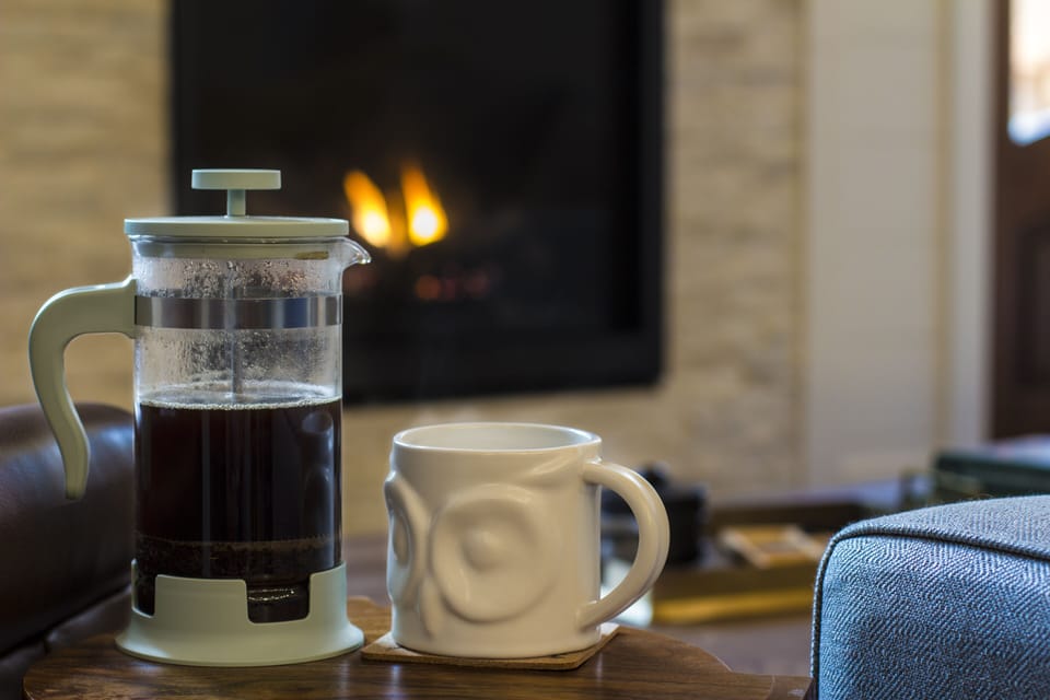 Relax in front of the fire with a cup of coffee