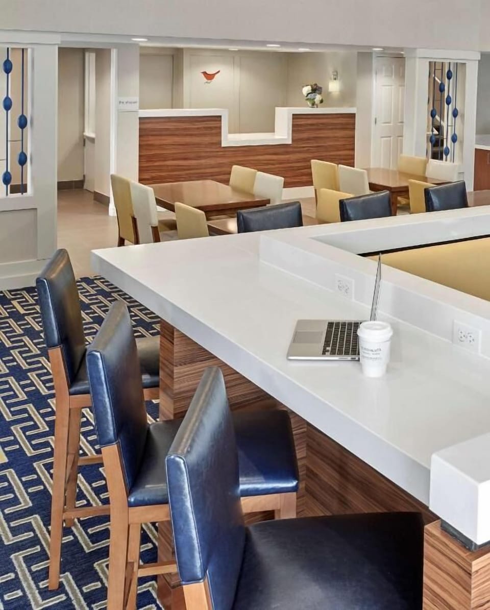 Settle in with coffee at the communal work table.