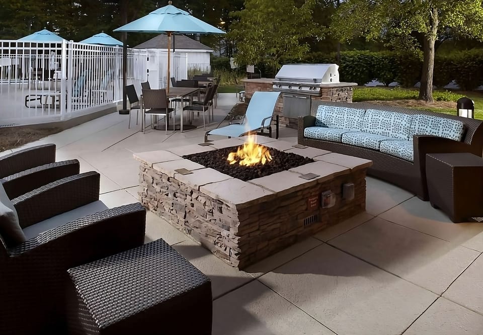 Gather by the fire pit for cozy nights outdoors.