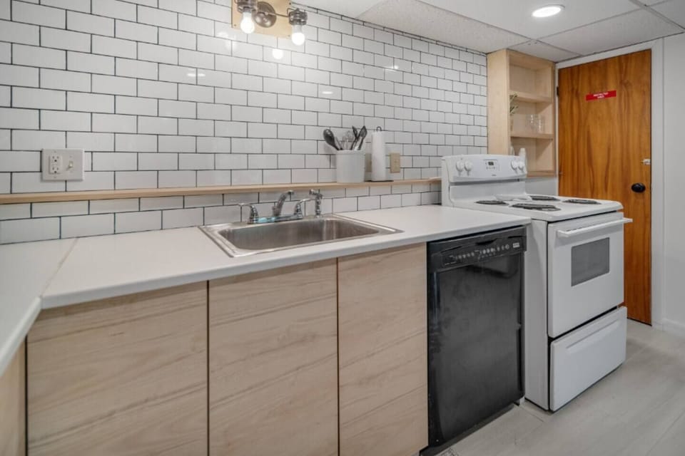 Full stocked kitchen with dishwasher and oven