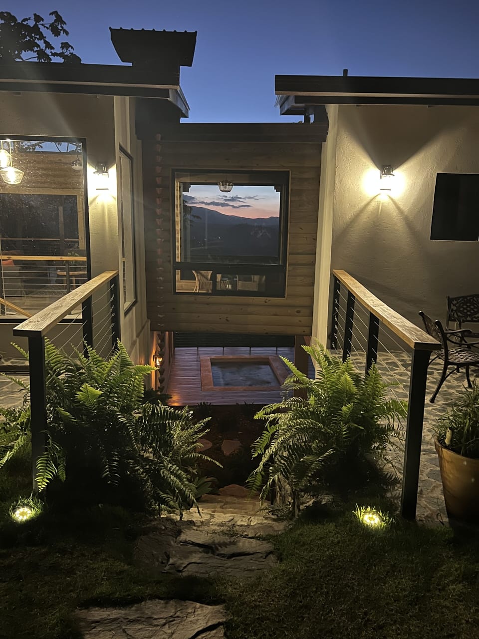 The bridge connecting the Upstairs master suite to the main living space.
