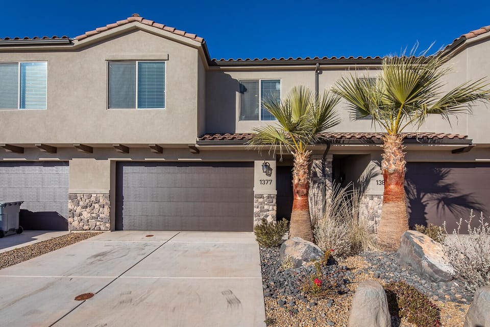 Front exterior w/ driveway parking for 2