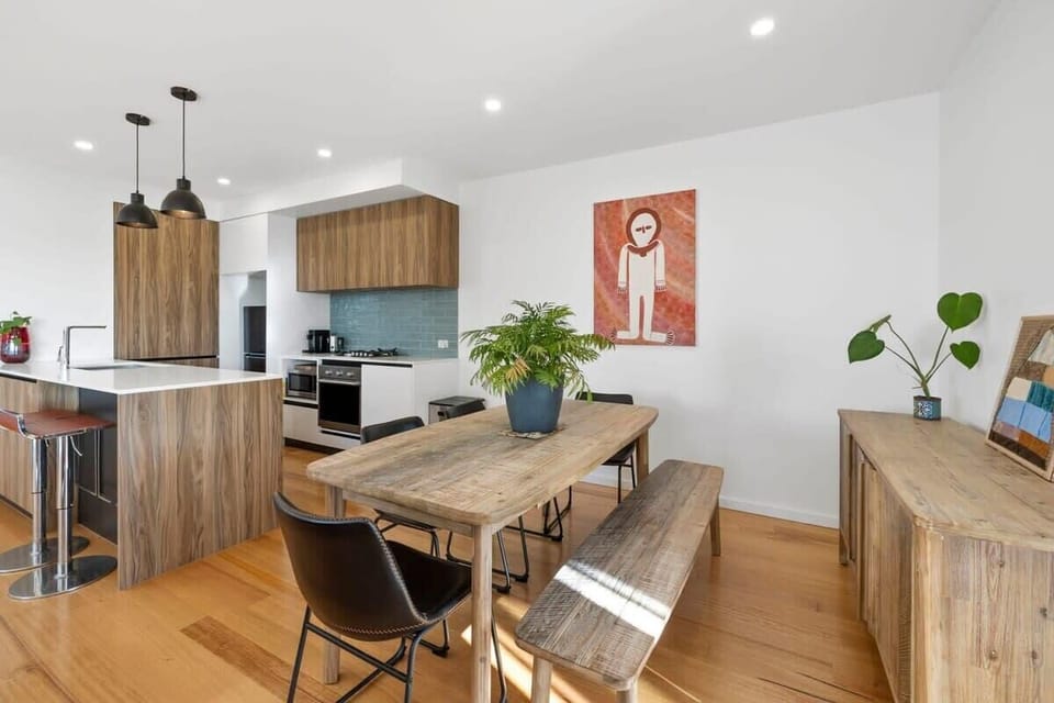 Open plan single level living, dining and kitchen