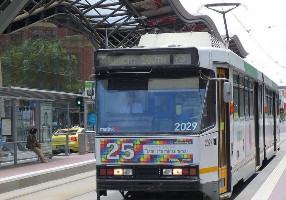 A tram stop located just outside the building.