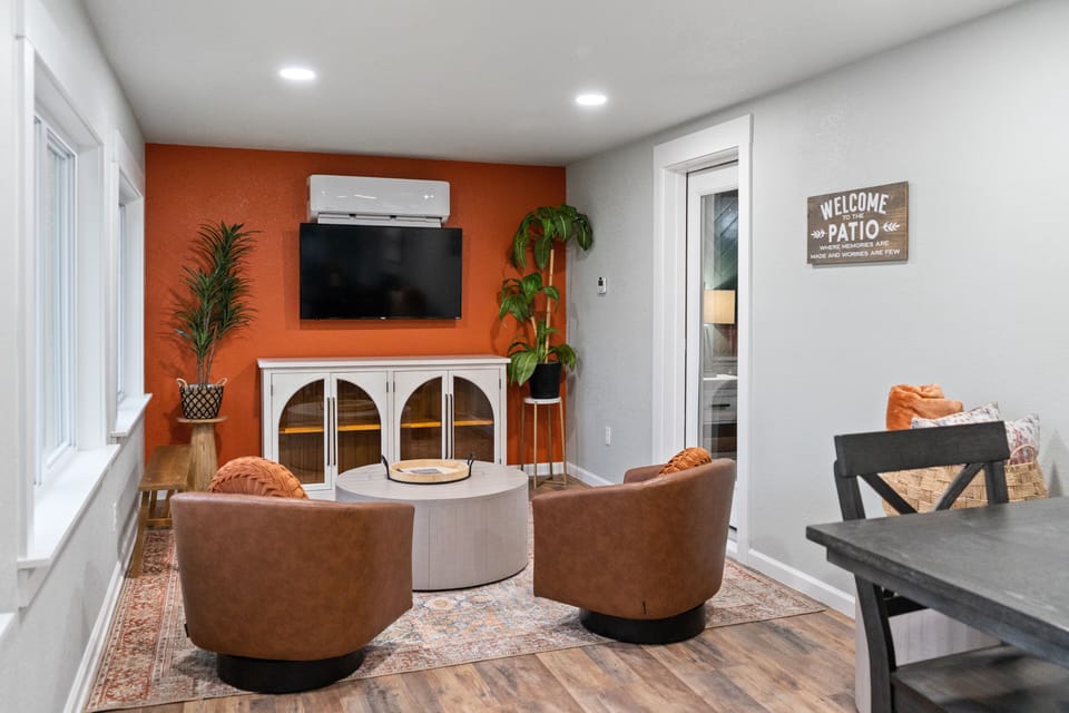 Sunroom accessibility from main level primary bedroom and exterior door entry from balcony porch. 