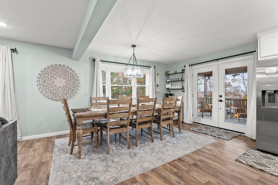 Solid wood dining table that seats 8 comfortably. Gather around for meals with family and friends. 