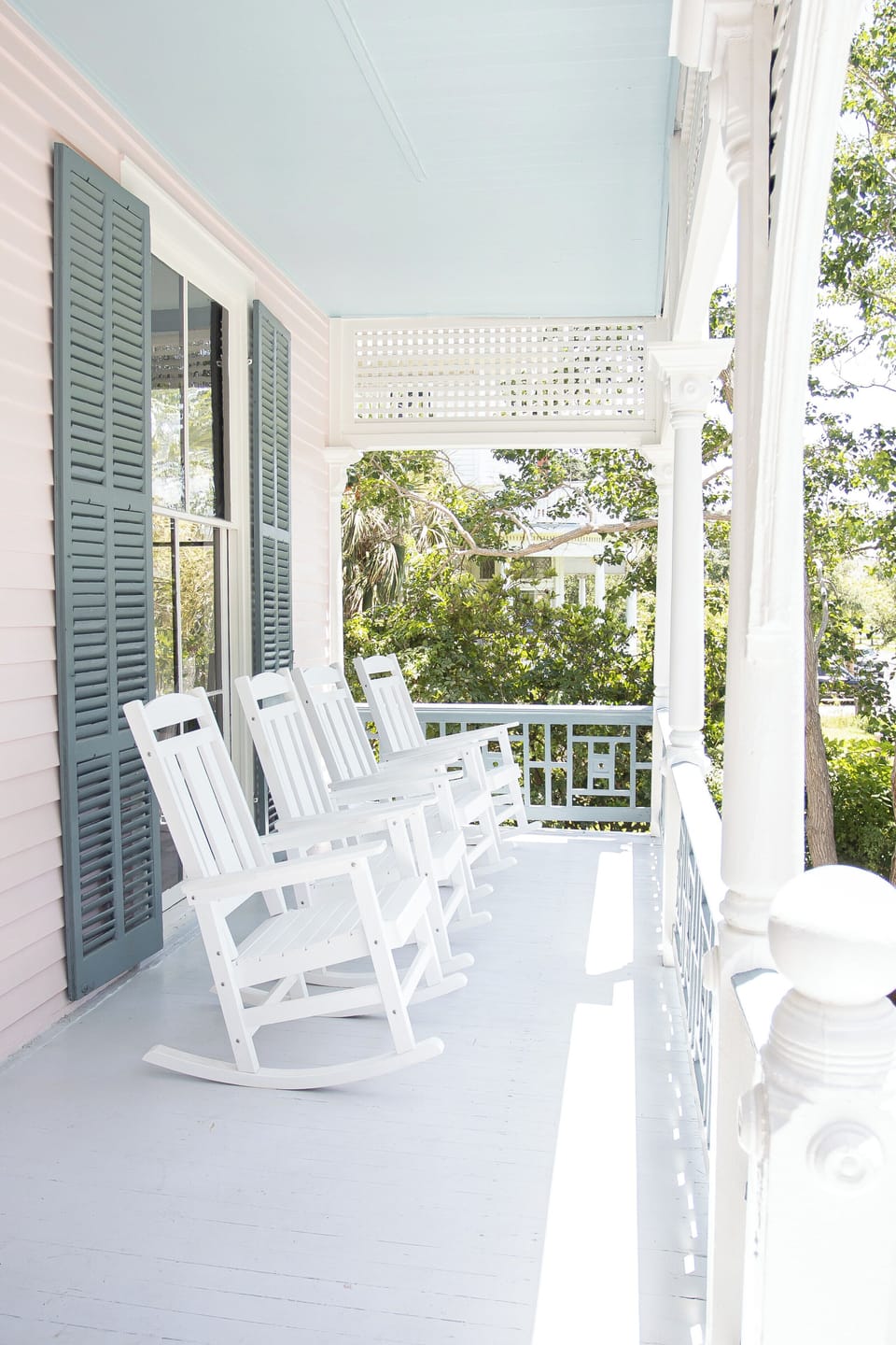 Relax on the front porch and take in the other beautiful Victorian's on Ball St.