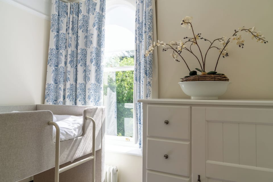 Pretty fourth bunk bedroom with full-size mattresses, perfect for adults too. 