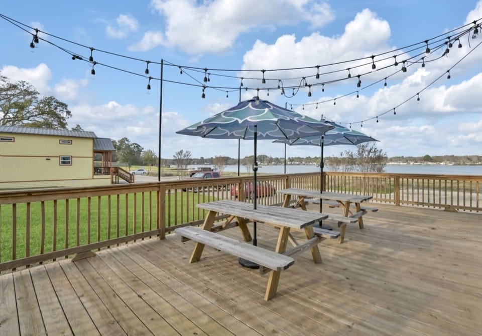 Dining space with shade umbrellas and ambient lighting 