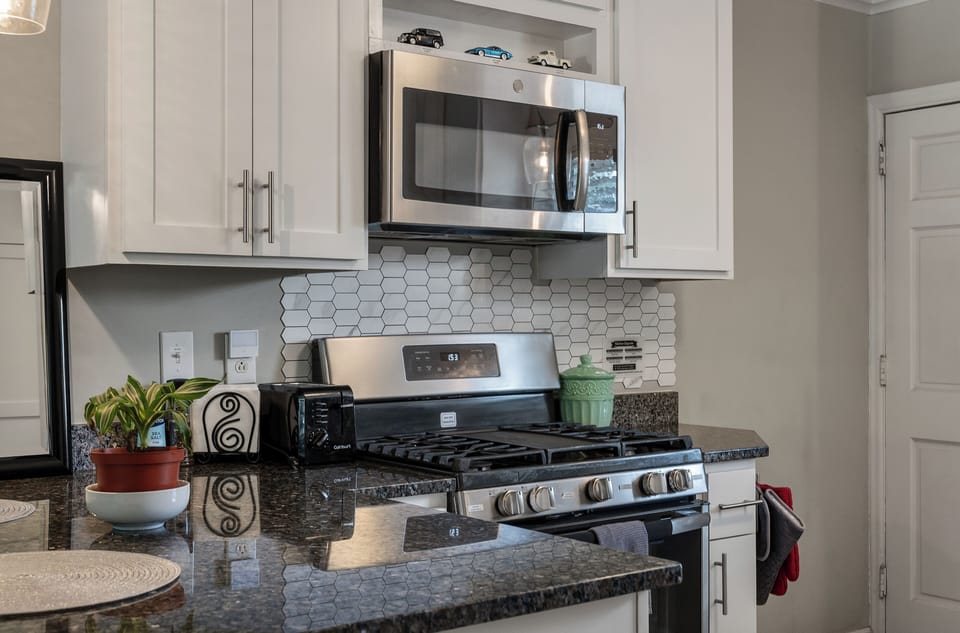 The kitchen has great updated stainless-steel appliances.