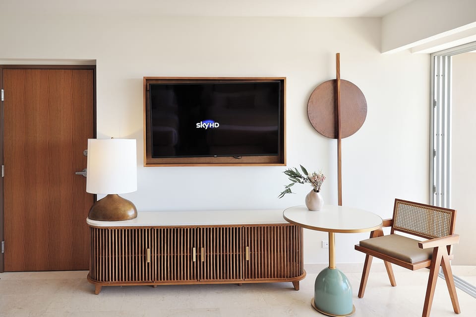 Enjoy minimalist design and a large TV for nights in.