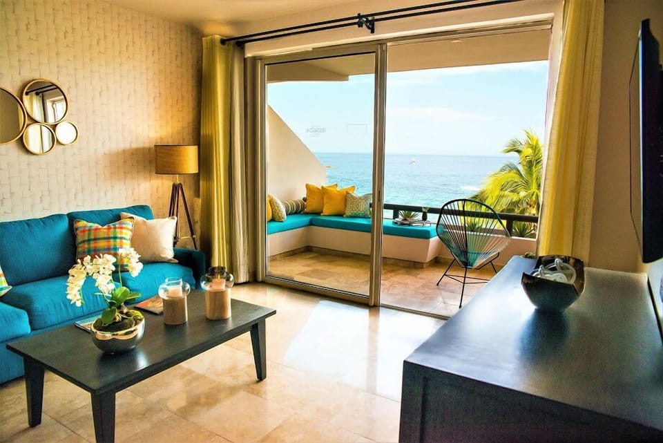 Unwind on the sofa and savor breezy oceanfront sunsets.