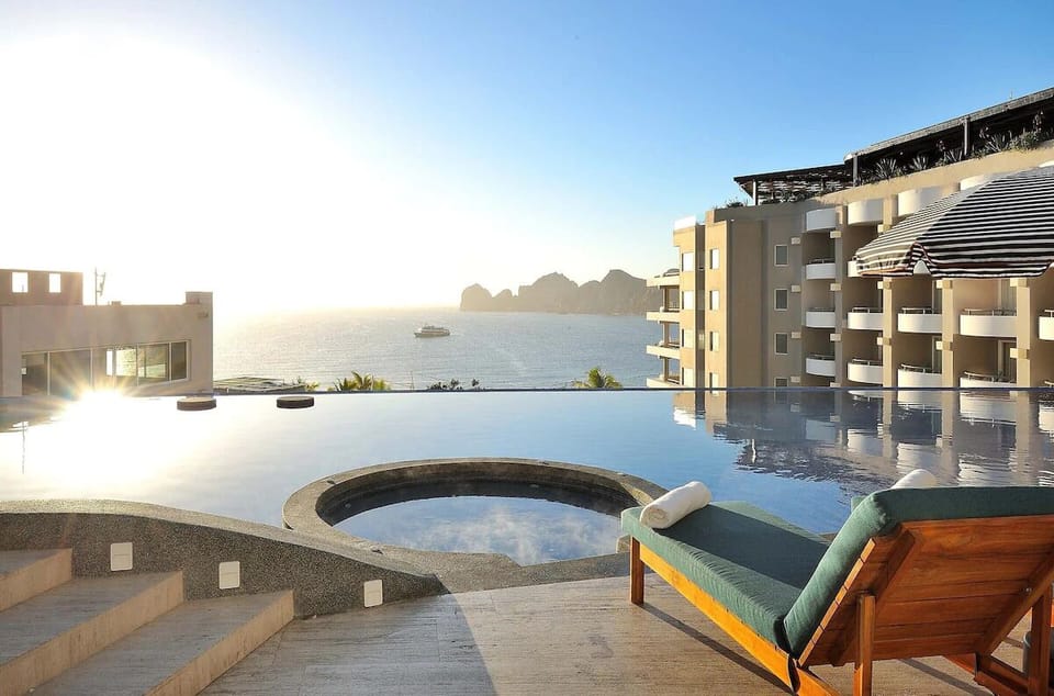 Unwind in the infinity pool as the sun melts away