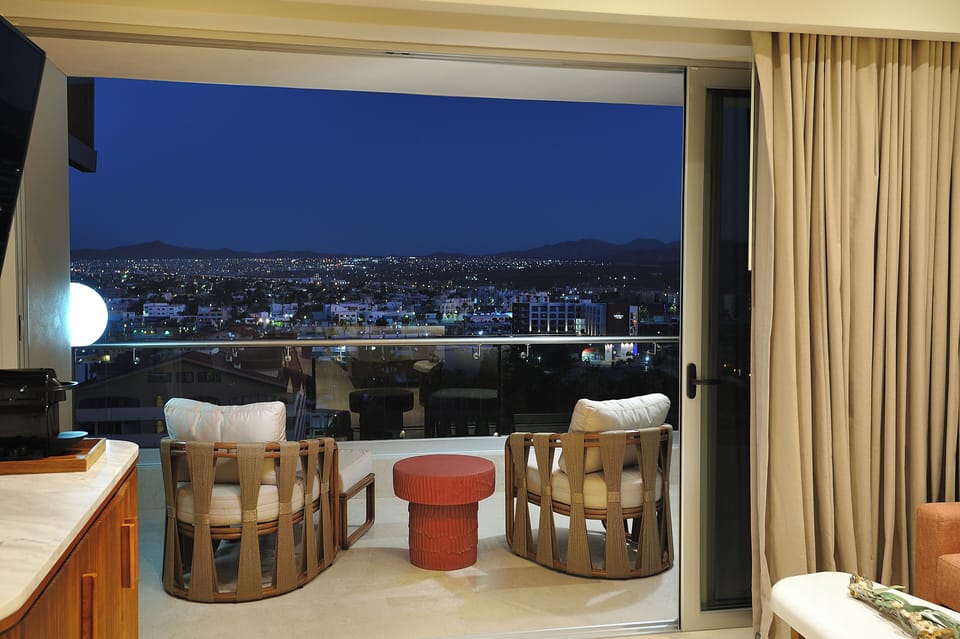 Toast the evening as twinkling skyline views take over.