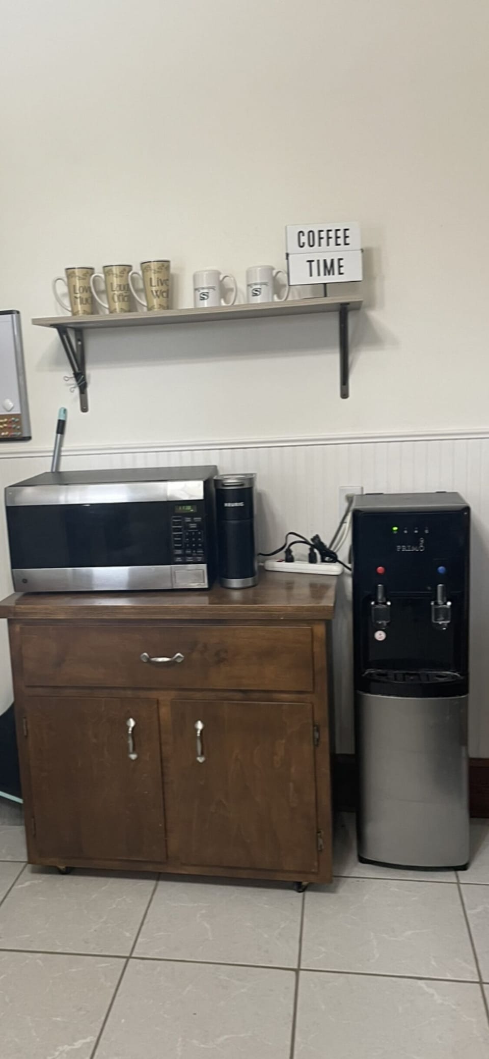 Microwave, water, coffee bar