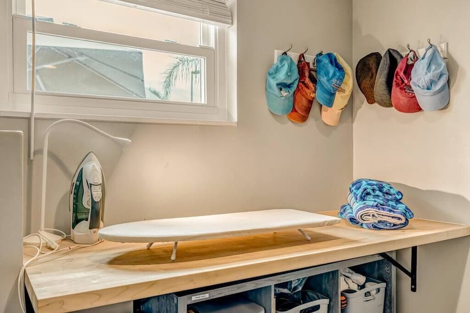 iron and ironing board with room to fold laundry