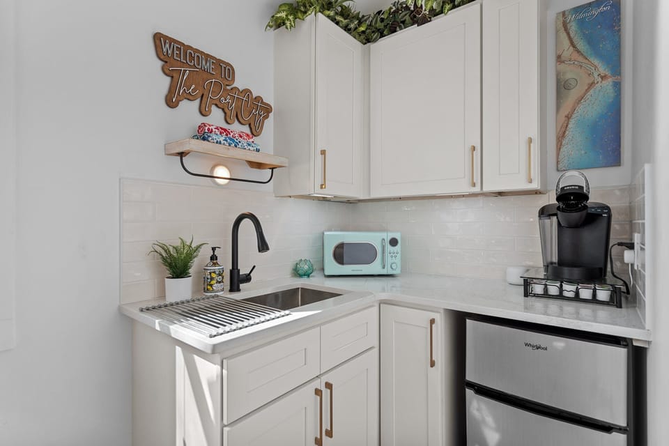 Kitchenette w/ sink, microwave, mini-fridge, Keurig and K-Cups