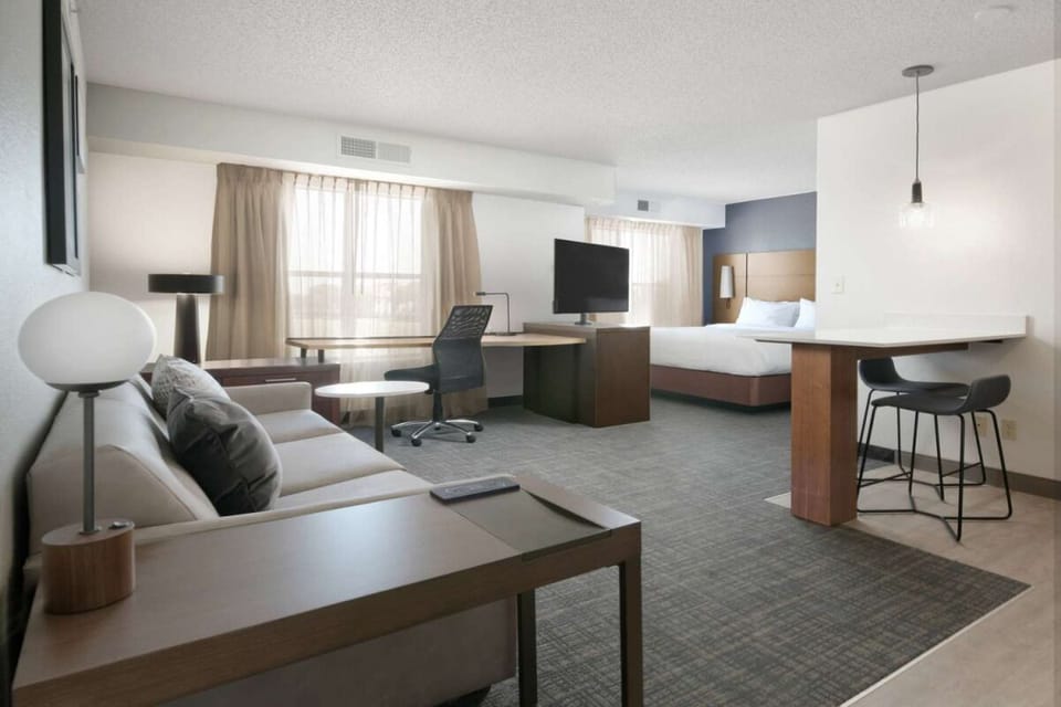 Stretch out in the spacious suite with lounging and workspace.