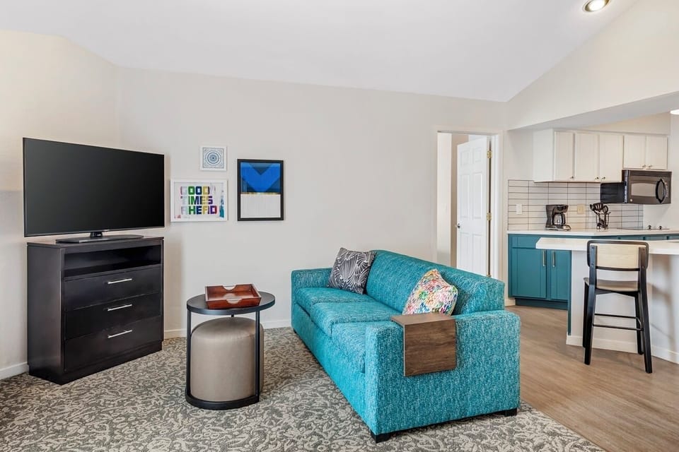 Relax on the cozy sofa for movies after exploring.