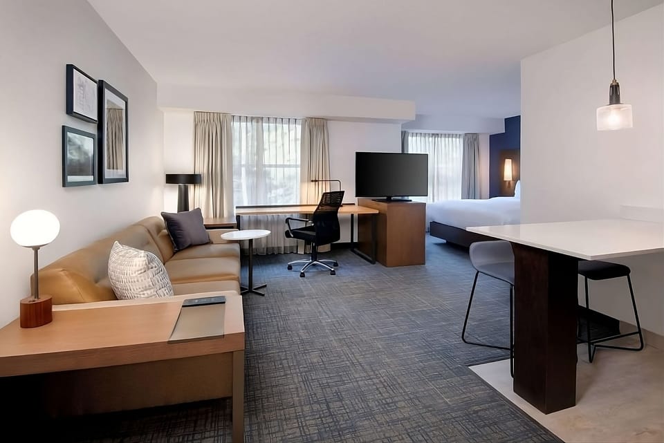Spread out in a spacious suite with lounge and workspace.