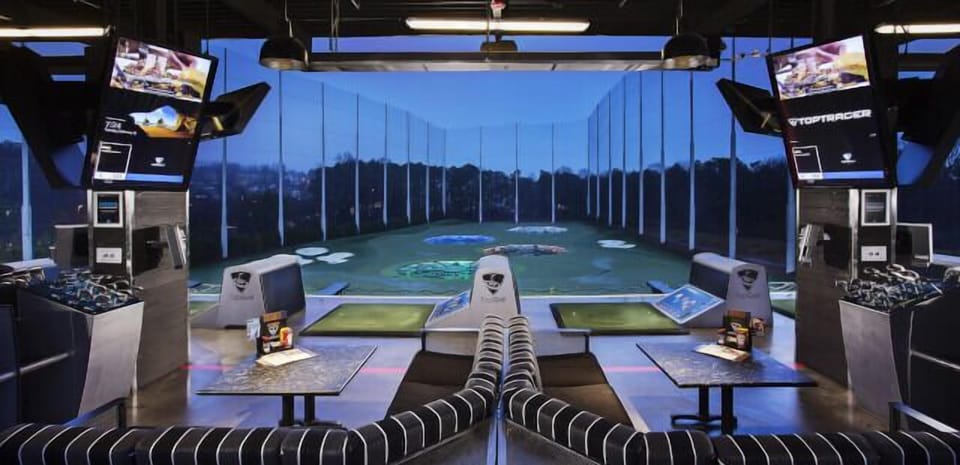 Swing into the night with an energetic, neon-lit driving range.