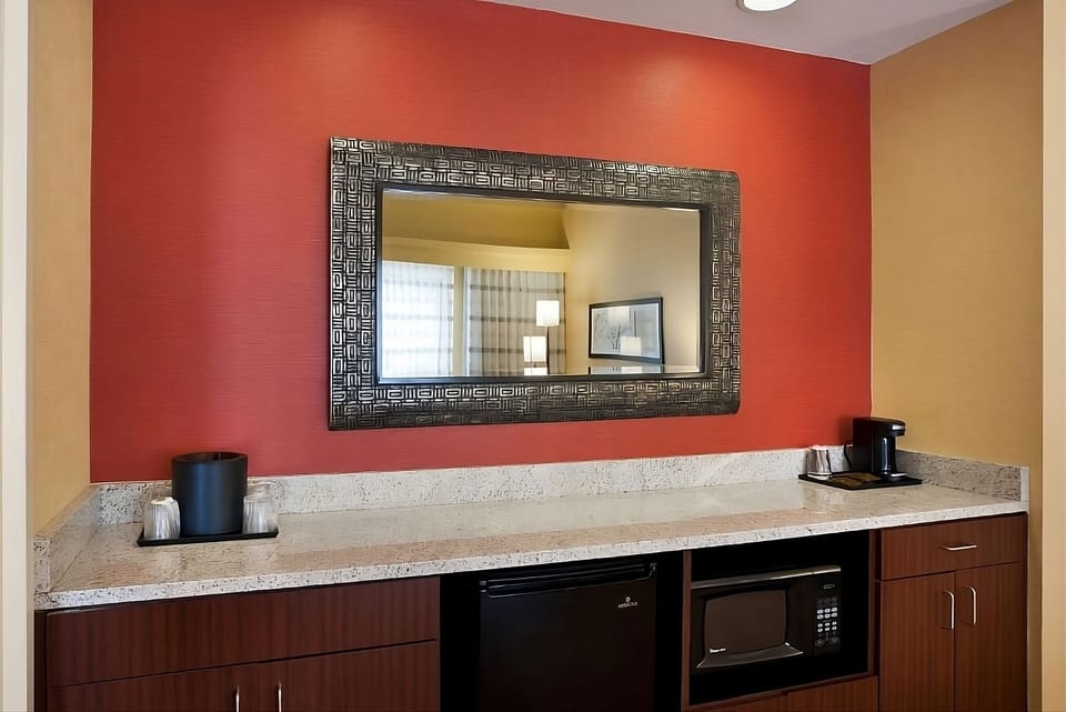 Enjoy easy snacks and coffee with fridge and microwave convenience.