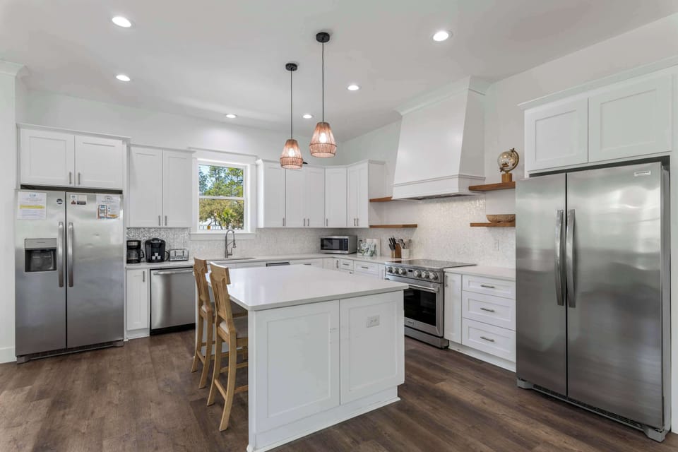 Custom kitchen with 2 full size refrigerators 