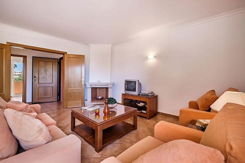 Gather for cozy evenings around the lounge and fireplace nook.