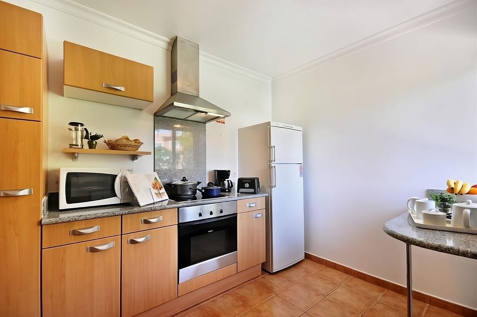 Stretch out in the airy lounge with garden-view patio doors.