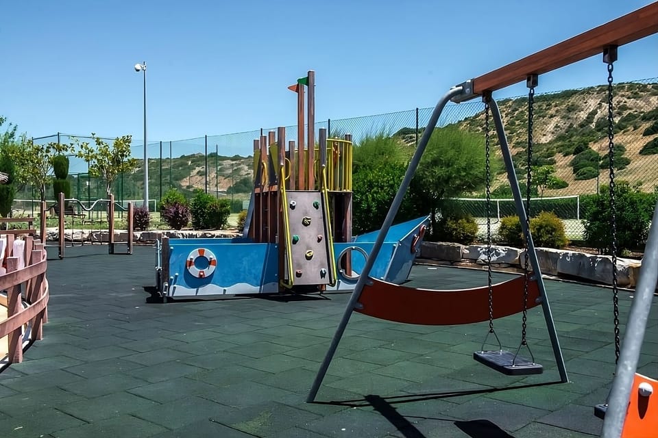 Swing, play, and burn energy on the family-friendly playground.