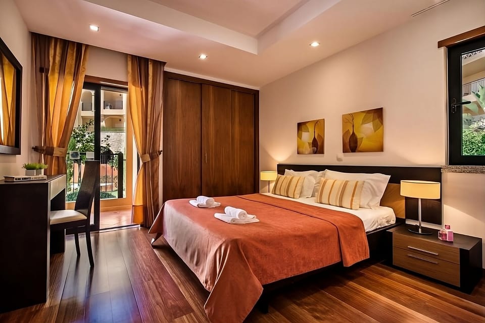 Relax in a stylish king bedroom with warm, hotel-quality comfort.