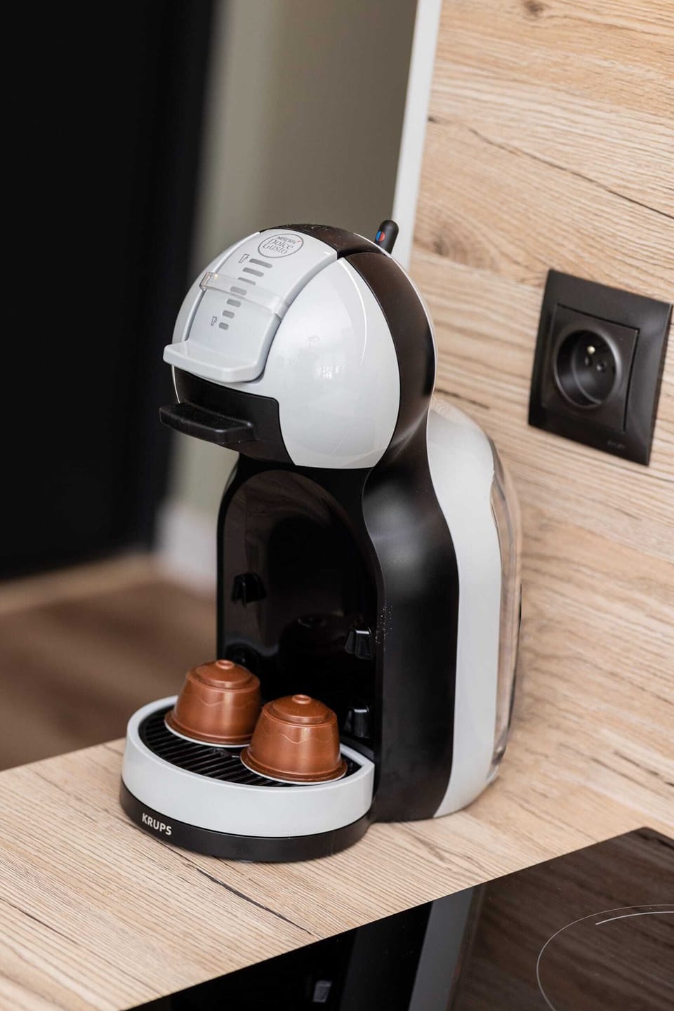 A coffee machine on the countertop, ensuring convenience for guests to enjoy their morning brew.
