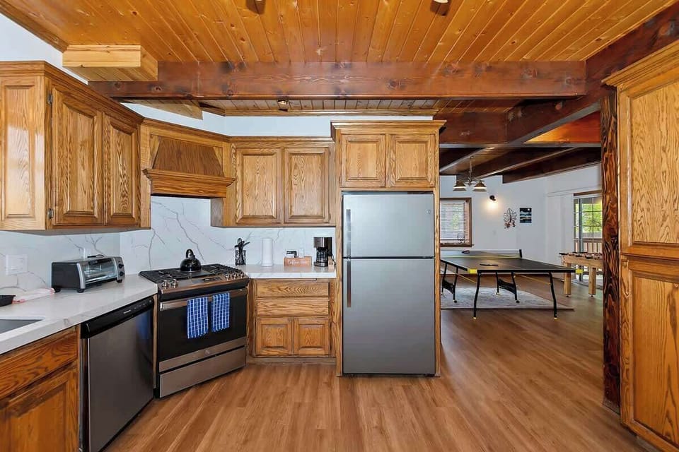 Kitchen, entertainment area behind. 