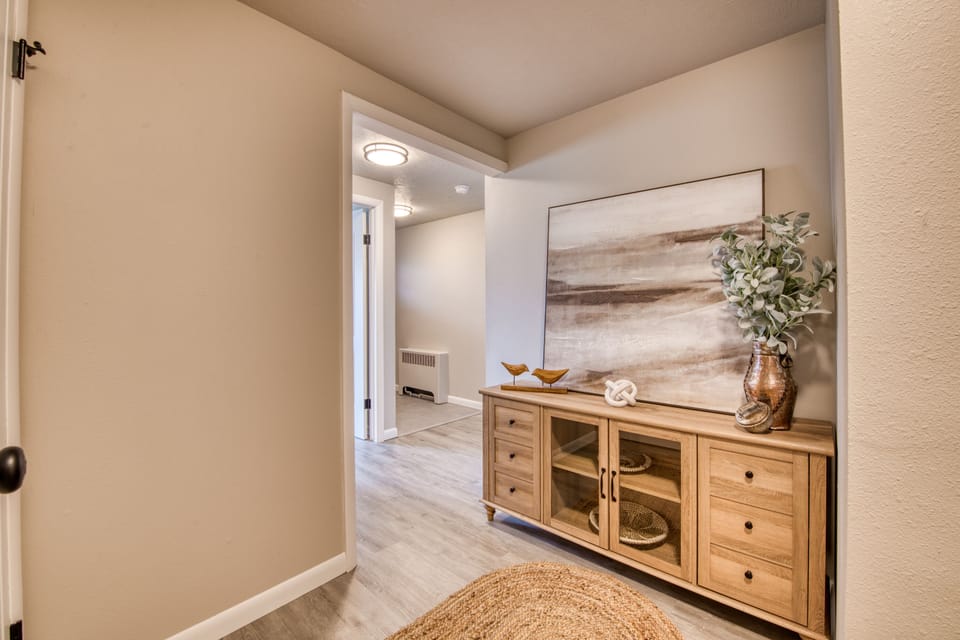 Hallway as you approach the 4th bedroom, den and walk out lower level patio