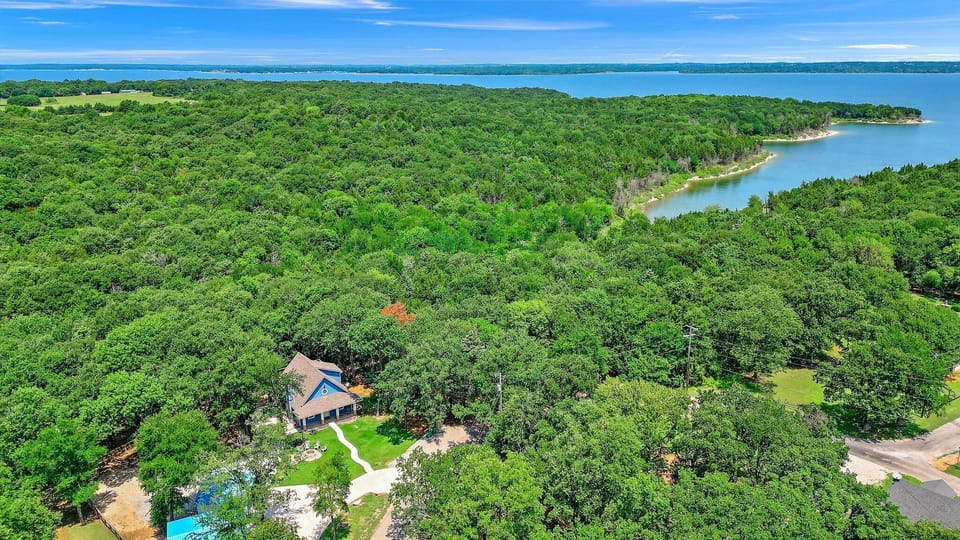 Arial view of property and fishing cove