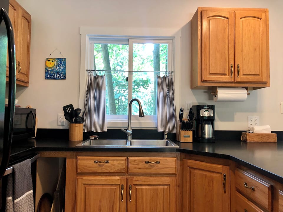 Do the dishes, bake a pie, or make a cup of coffee, this kitchen has it all!