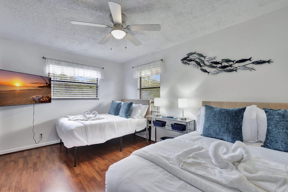 The room's decor is a harmonious blend of modern elegance and cozy charm, with carefully selected furnishings and accents that enhance the overall ambiance.