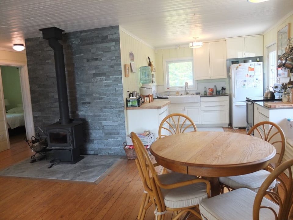 Kitchen table, kitchen and wood stove