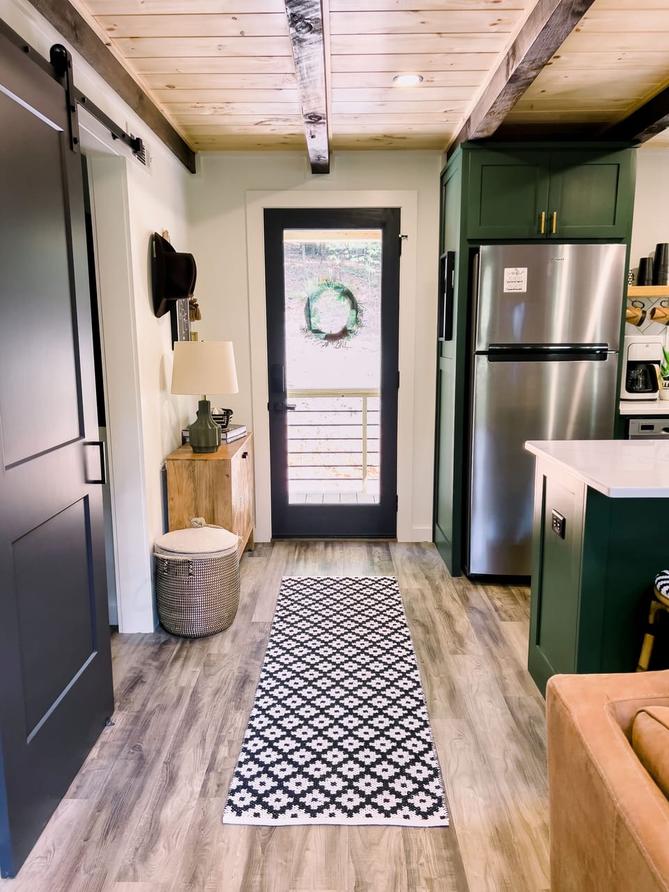 Entryway into open concept kitchen/living