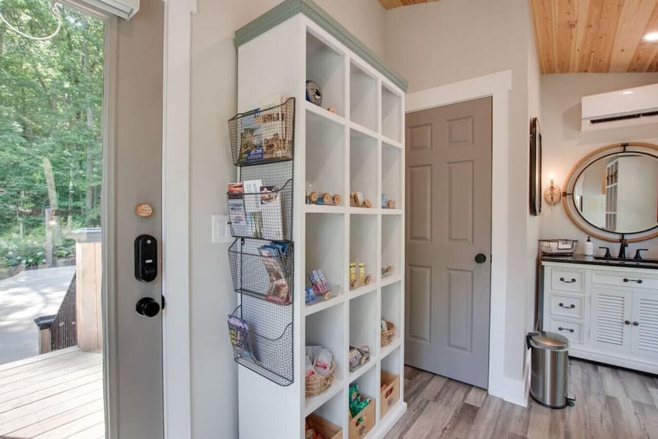 Visit the Tree Store in the communal area at the bottom of the hill | stocked with microwave-ready meals, ice cream, s'mores kits, and souvenirs, it offers everything you need to enhance your stay.