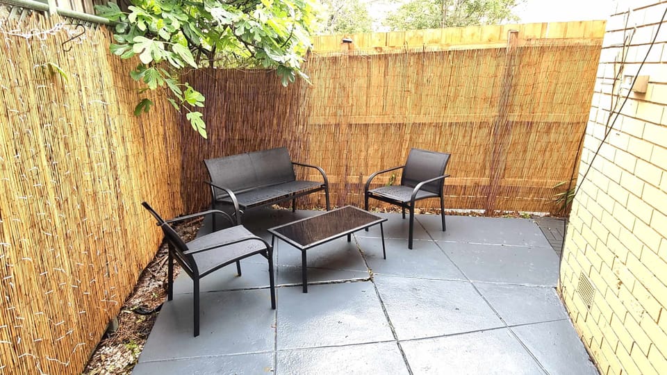 Spacious and private unshared back patio accessed off the second bedroom