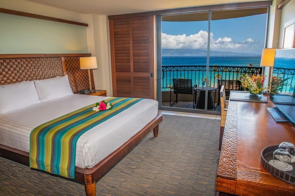 Breathe in sea breezes from bed to your private balcony.