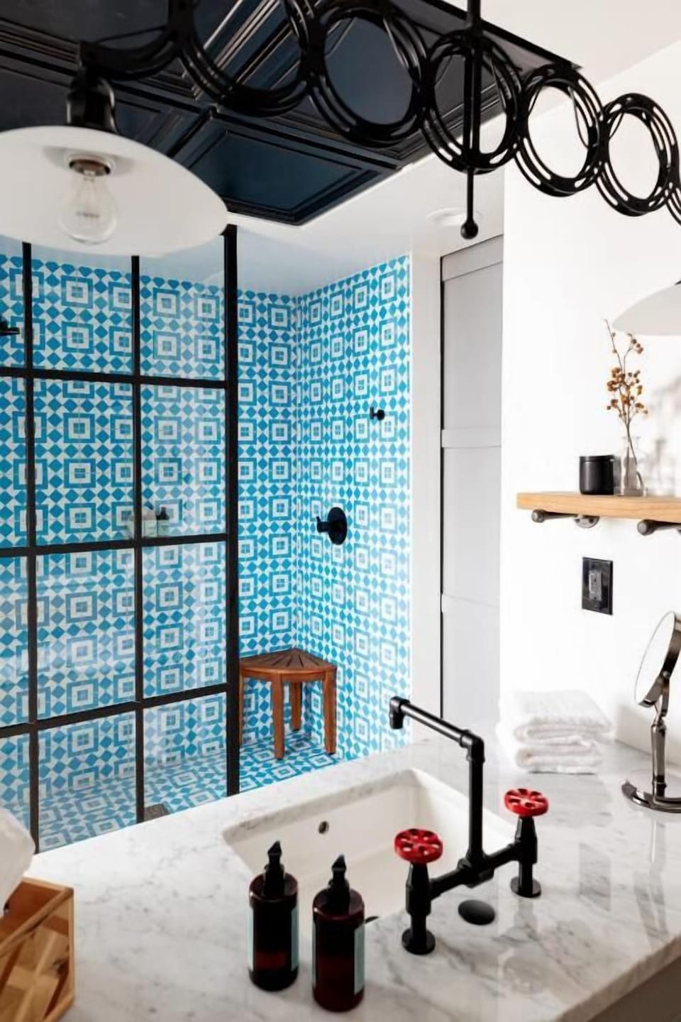 Indulge in a spa-like shower wrapped in bold tile.