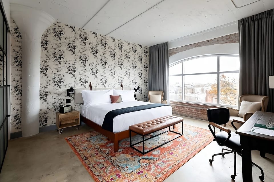 Settle into a calm corner with views and a workspace.
