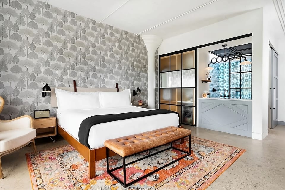 Unwind in crisp linens with chic loft-style accents.