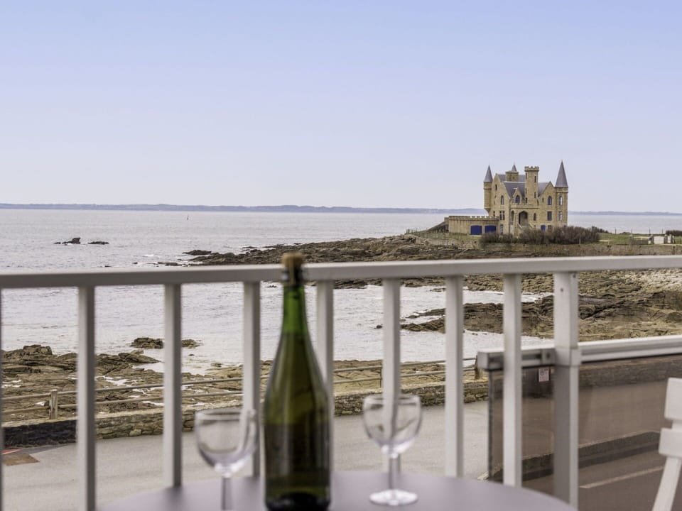 Sky, Water, Bottle, Wine, Wood, Barware, Fence, Building, Coastal And Oceanic Landforms, Drinkware
