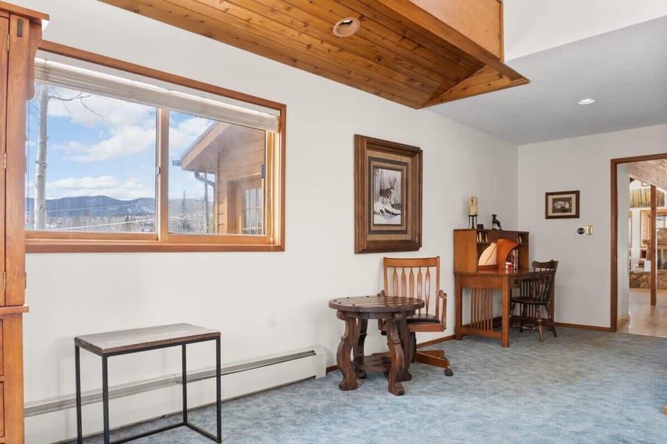 The workspace in the master bedroom features a desk and chair great for any remote work needs.